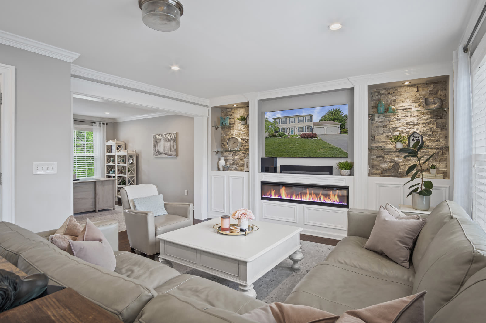 Bright sunroom interior listing photo