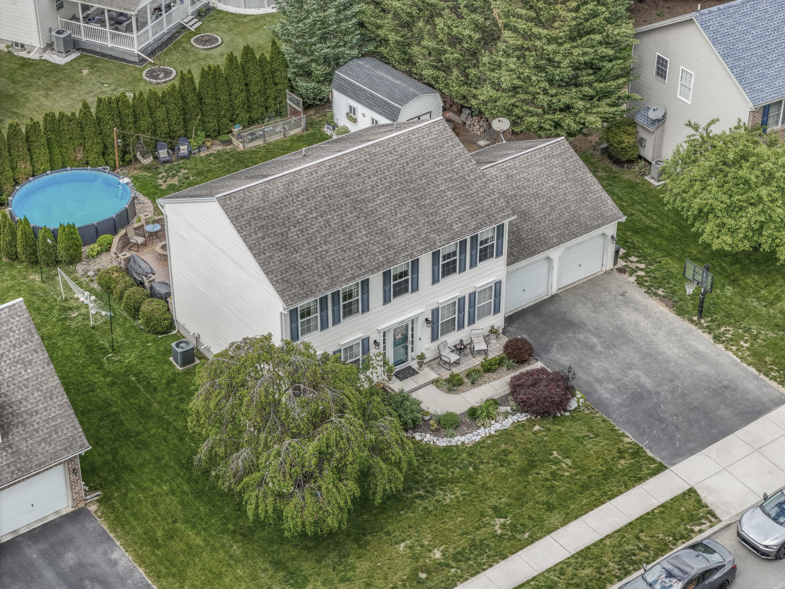 Aerial drone photo showing the property and surrounding lot